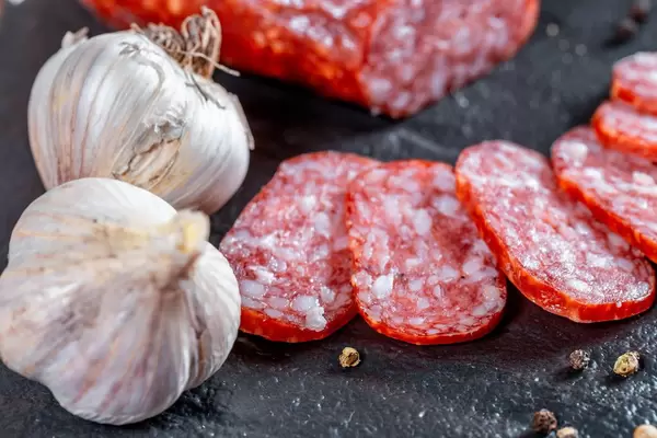 Sliced sausages and garlic  Flip 2019