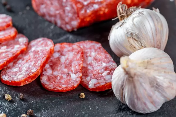 Sliced sausages and garlic