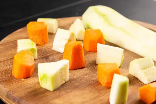 Sliced Zucchini and Carrots on the cutting board