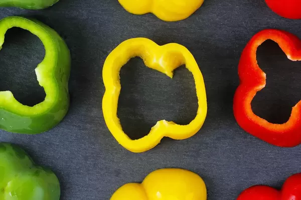 Slices of bell pepper, red, yellow and green