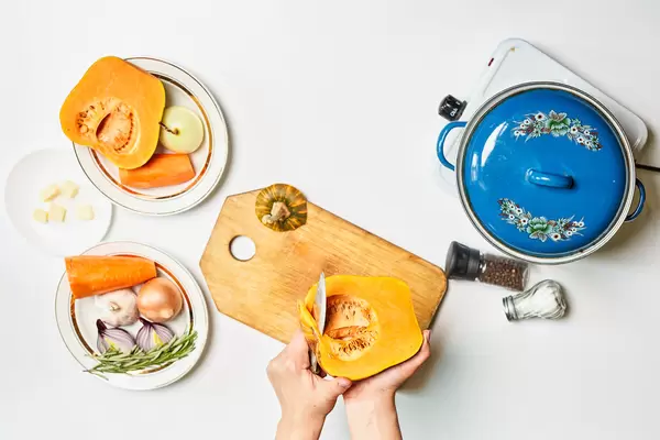Slicing pumpkin for a delicious soup