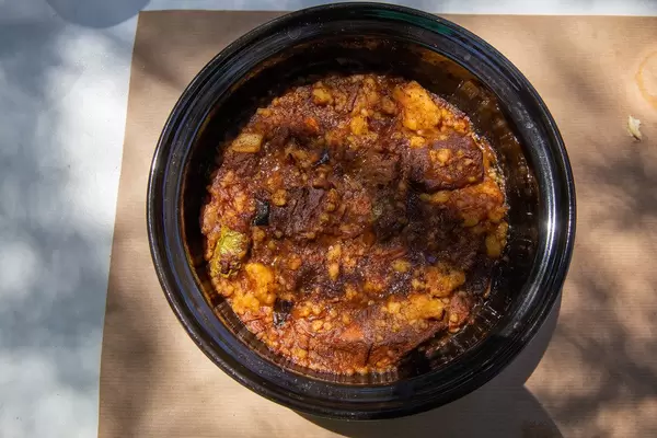 Slow Cooker Beef Stew in a dark bowl