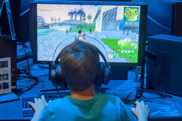 Small boy playing Battle Royal - IFA Berlin 2018