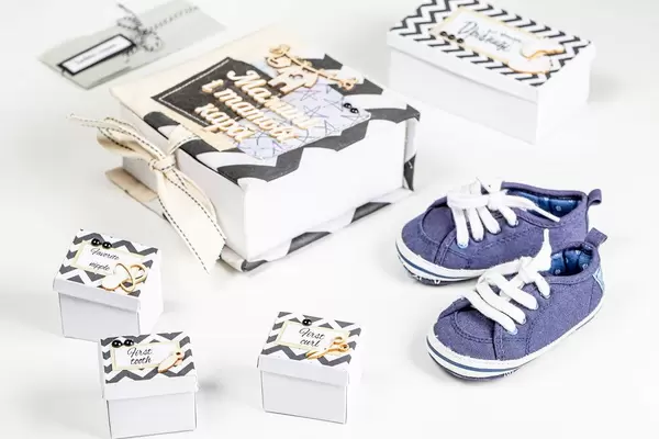 Small children's sneakers with boxes for the baby's first things