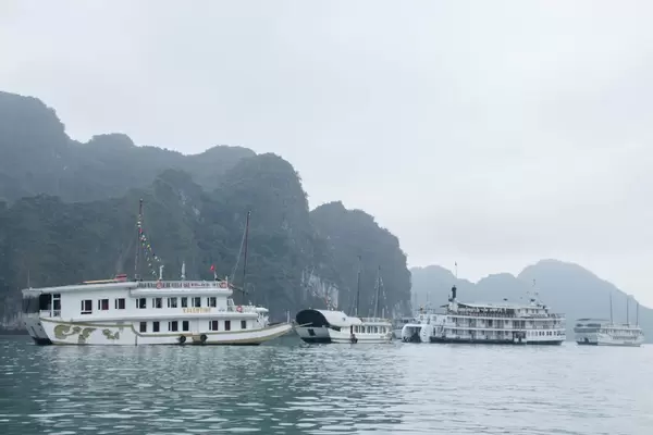 Small Cruising Ship At Sea Halong Bay Vietnam