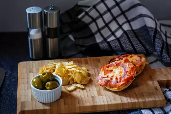 Small pizza on a cutting board