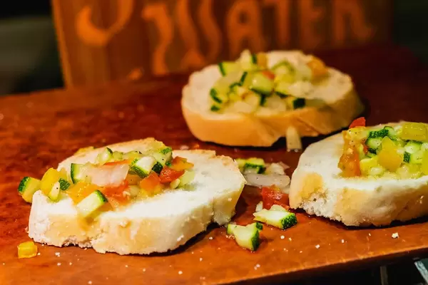 Small sliced bread with toppings