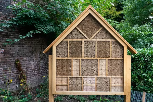 Small wooden booth showing different materials in cross-section