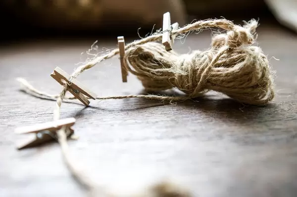 Small wooden clips on rope