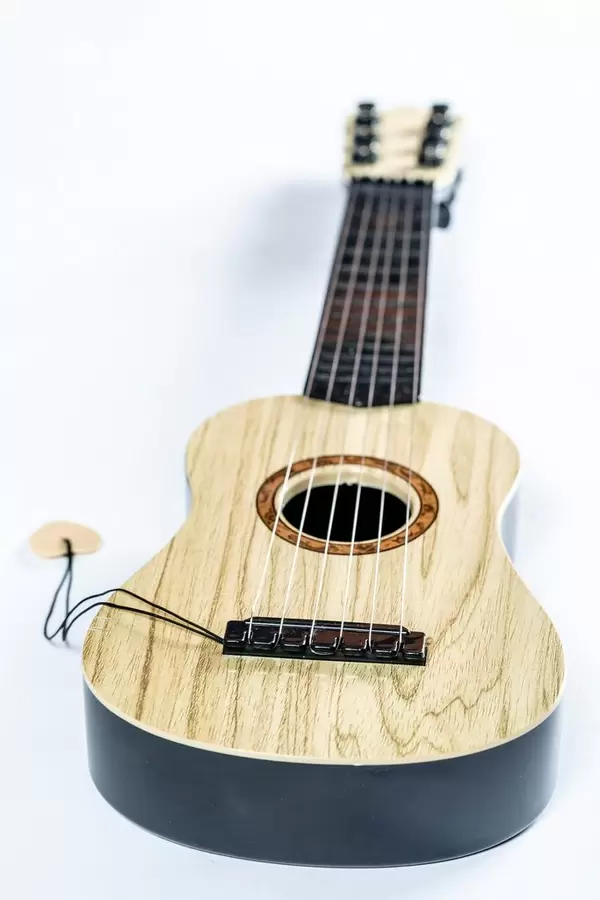 Small wooden guitar  Flip 2019