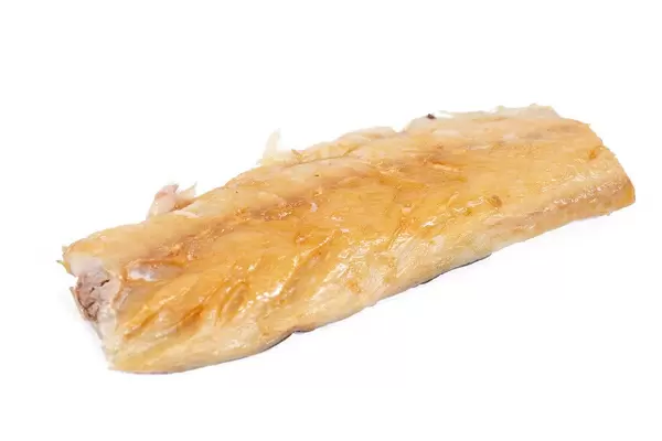 Smoked Mackerel fish isolated above white background