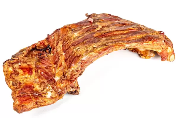 Smoked pork ribs on a white background