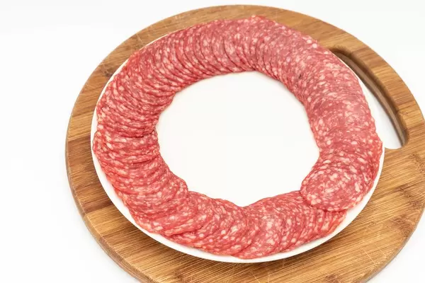 Smoked red Sausage arranged on the plate