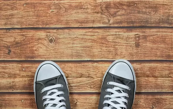 Sneakers on wooden deck