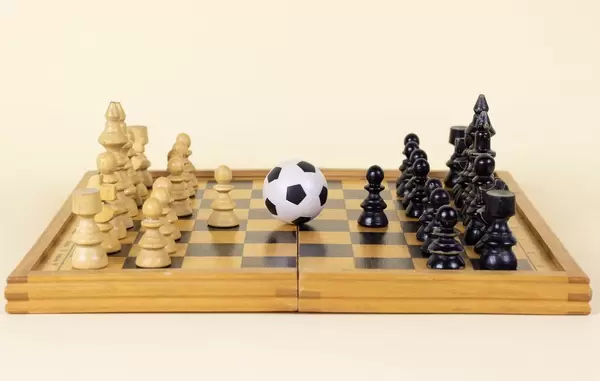 Soccer ball on a chess board