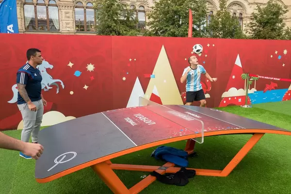 Soccer fans playing Teqball