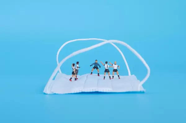 Soccer players on medical face mask