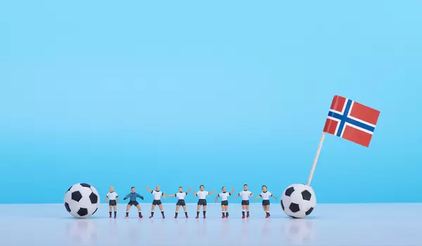 Soccer players with flag of Norway