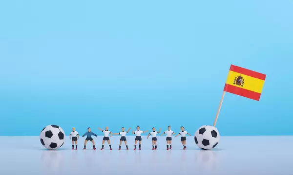 Soccer players with flag of Spain