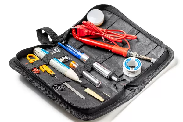 Soldering tool set in black case