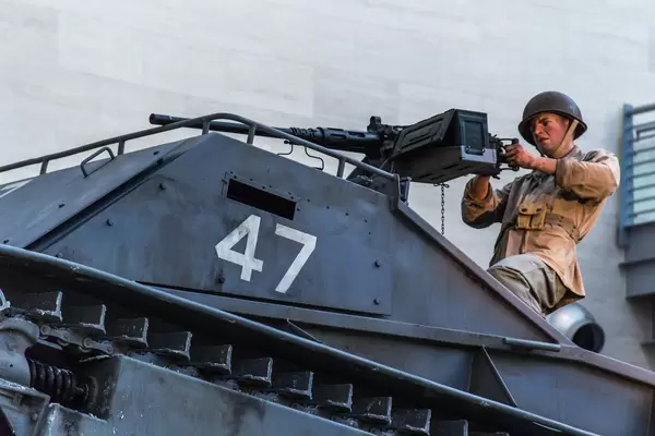 Soldier shooting on the First Tank