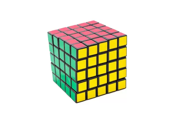 Solved Rubik's cube 5x5x5 on white background with green, yellow and red sides