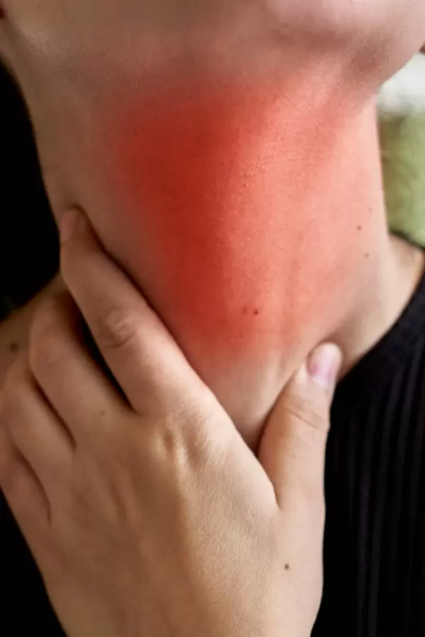 Sore throat of a woman