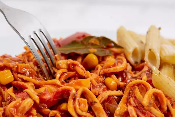 Spaghetti Bolognese on the plate with fork