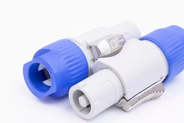 Speakon adapter for Speaker Cables above white background