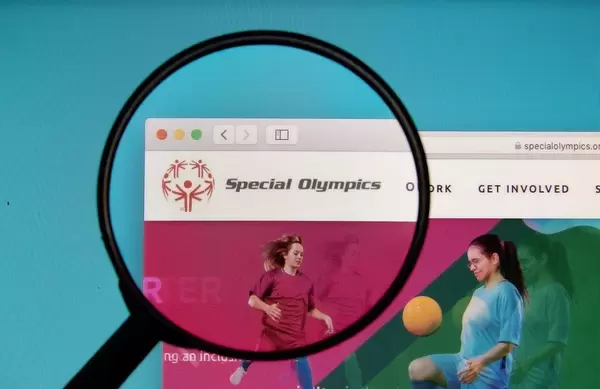 Special Olympics logo on a computer screen with a magnifying glass