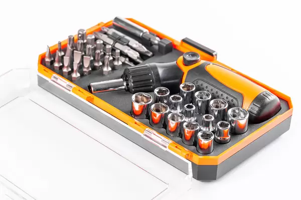 Specialized screwdriver with bits set in box