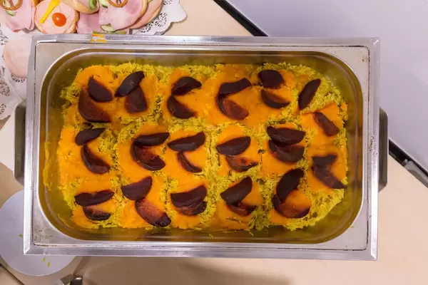 Spicy beetroot on rice with dates and ginger-carot sauce - top view