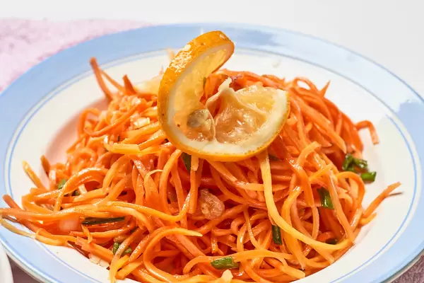 Spicy korean carrot salad with cracked coriander seeds