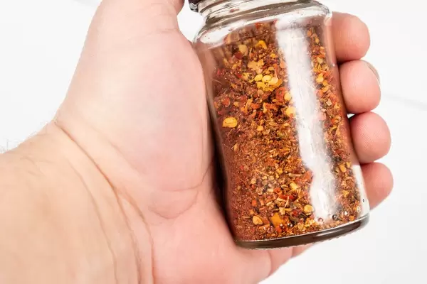 Spicy Red Paprika Jar in the hand