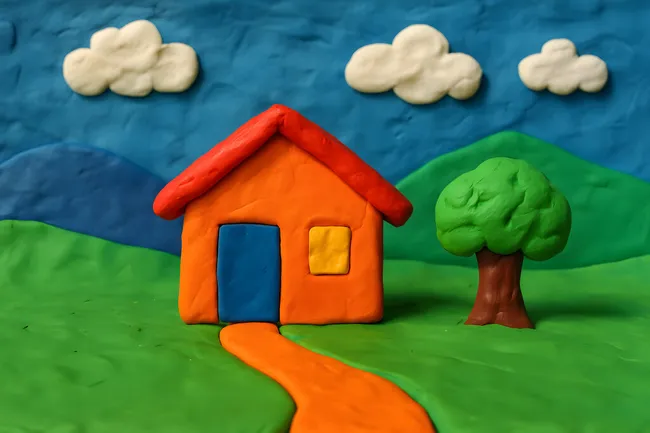 Spielerische Lehmhaus-Landschaft in Pastellfarben