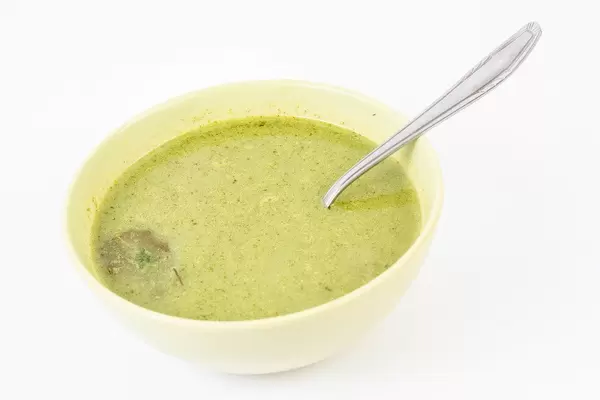 Spinach Soup served in the bowl above white background (Flip 2019)