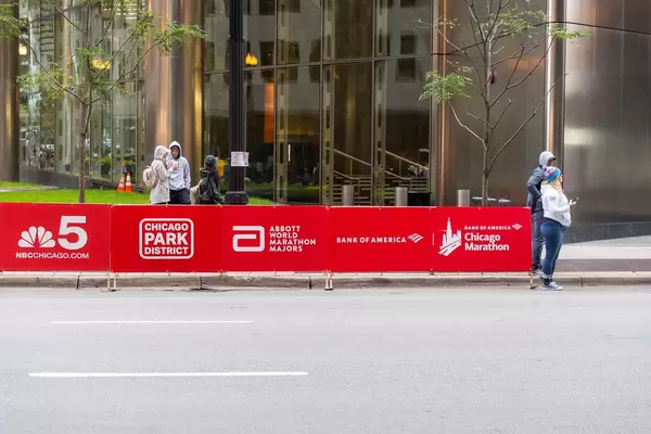 Sponsors ad on the side walk of Chicago Marathon: NBC Chicago Channel 5, Chicago Park District, Abbot World Marathon Majors and Bank of America