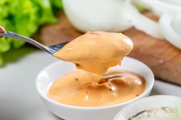 Spoon with hamburger sauce close-up (Flip 2019)