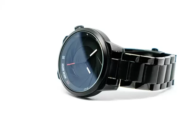 Sporty wristwatch on white background