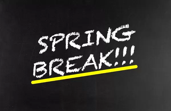 Spring break written on blackboard