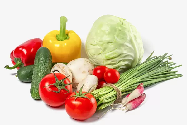 Spring fresh vegetables on white background