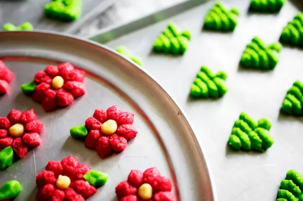 Spritz cookies in baking sheets