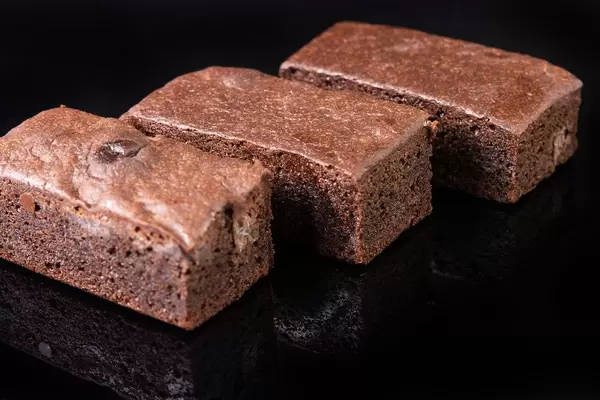 Square Chocolate Muffins on black reflective background (Flip 2019)