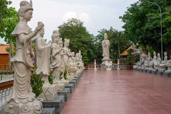 Square with Lady Buddha Statues in different Positions at the Truc Lam Phuong Nam Zen Monastery in Can Tho, Vietnam
