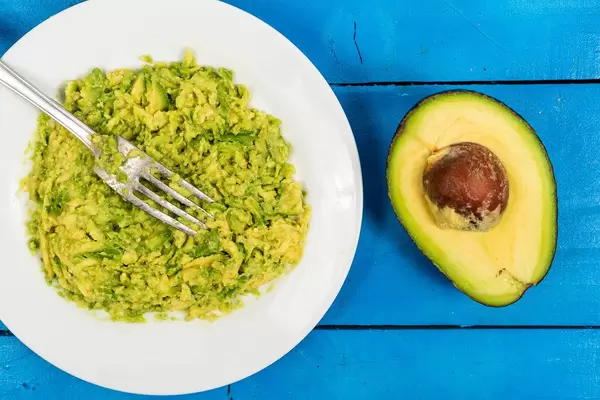 Squashed Avocado with fork on the plate (Flip 2020)