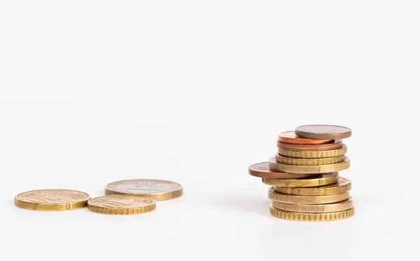 Stack of coins isolated on white background