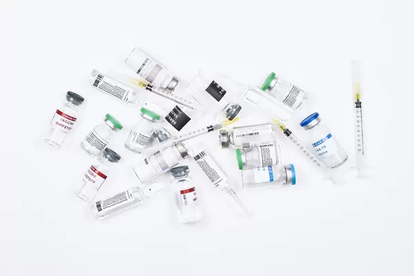 Stack of different covid-19 vaccine from various medical drug manufacturers