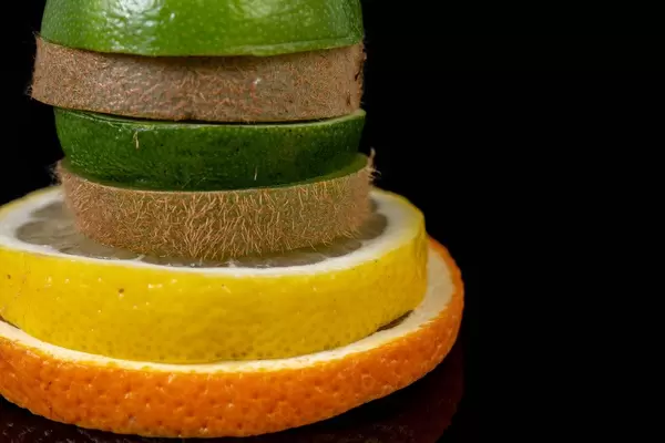 Stack of sliced Orange Lemon Lime and Kiwi (Flip 2019)