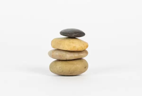 Stacked stones on white background