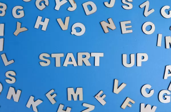Start up written with wooden letters
